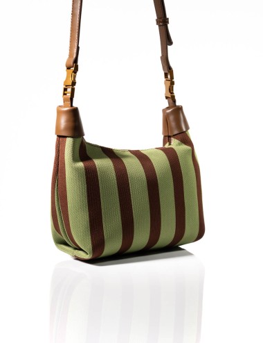 Cette image contient Sac à Main Cabas Rayures avec Chaîne Dorée chez Joliesse. à 139,99 TND en Tunisie. L'hexa de l'arrière plan