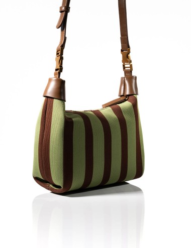 Cette image contient Sac à Main Cabas Rayures avec Chaîne Dorée chez Joliesse. à 139,99 TND en Tunisie. L'hexa de l'arrière plan