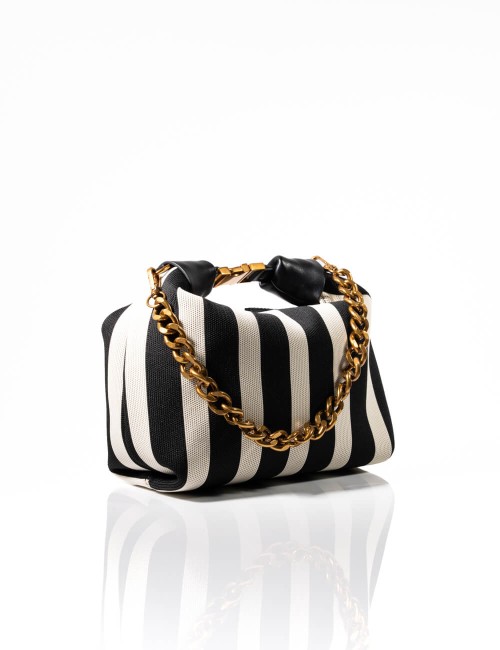 Cette image contient Sac à Main Cabas Rayures avec Chaîne Dorée chez Joliesse. à 139,99 TND en Tunisie. L'hexa de l'arrière plan