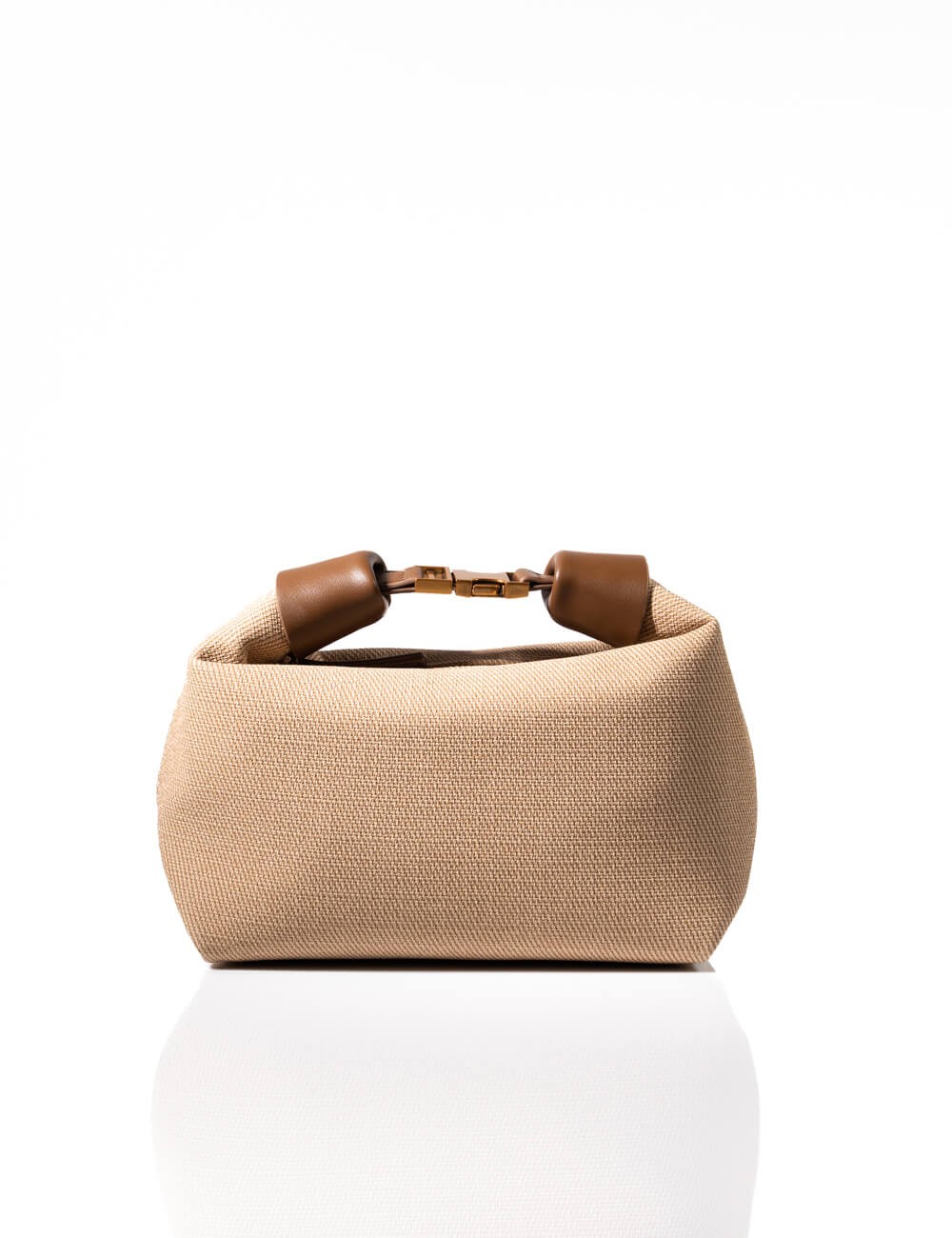 Cette image contient Sac à Main Cabas Rayures avec Chaîne Dorée chez Joliesse. à 139,99 TND en Tunisie. L'hexa de l'arrière plan