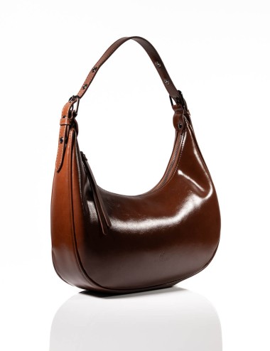 Cette image contient Sac à Main Demi-Lune chez Joliesse. à 129,99 TND en Tunisie. L'hexa de l'arrière plan est #E7E7E7