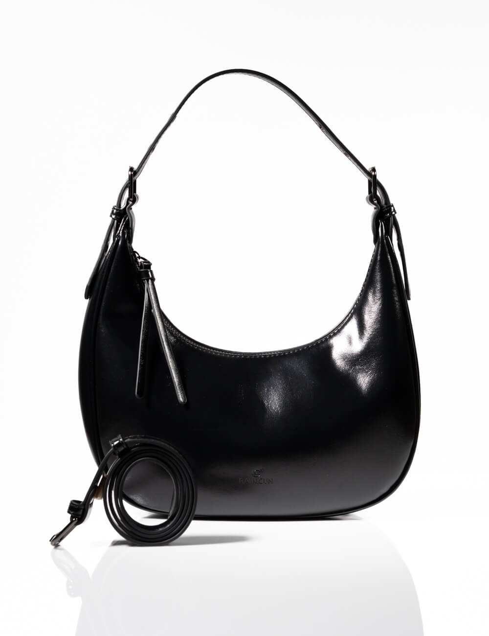 Cette image contient Sac à Main Demi-Lune chez Joliesse. à 129,99 TND en Tunisie. L'hexa de l'arrière plan est #E7E7E7