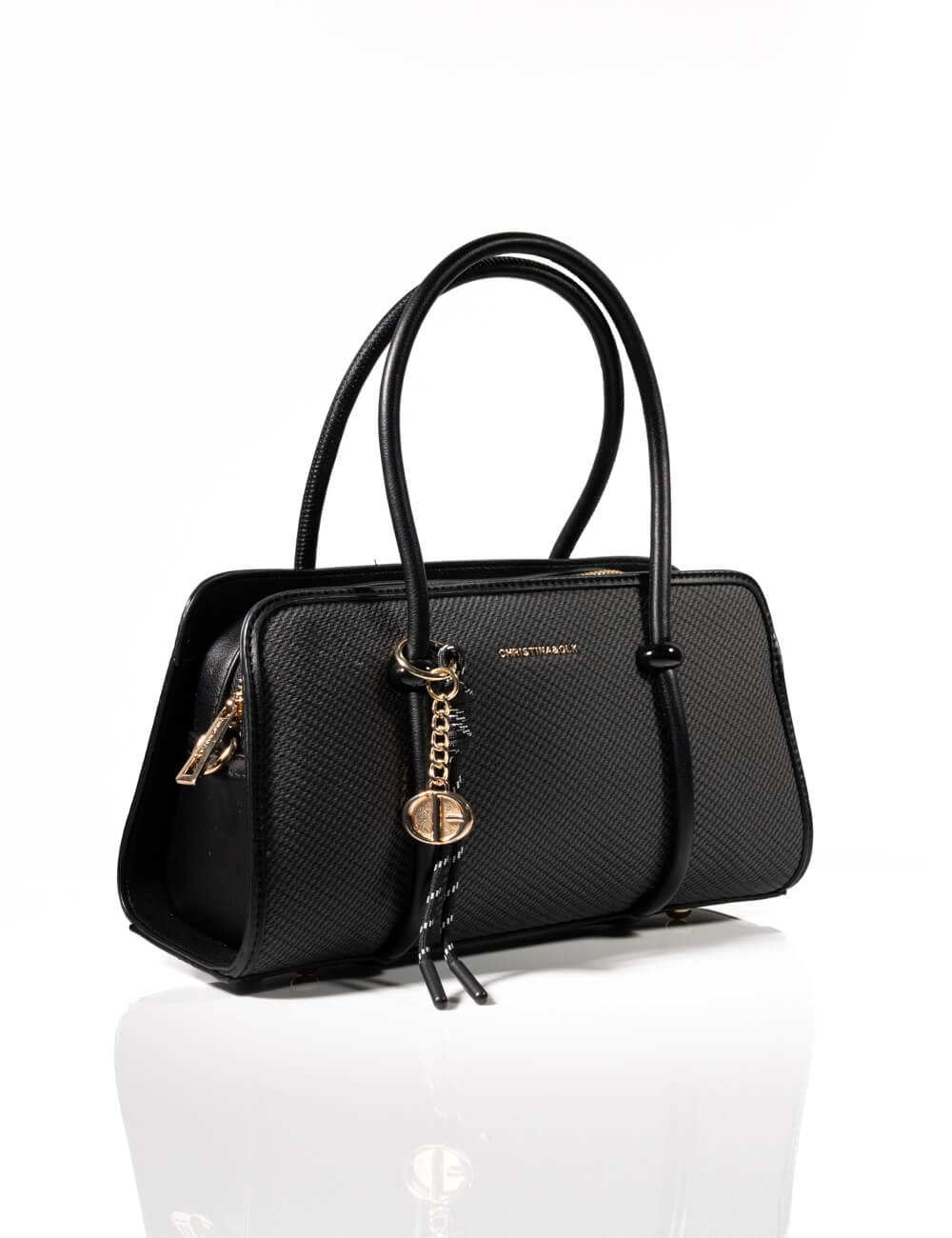 Cette image contient Sac à Main avec Détails Dorés chez Joliesse. à 139,99 TND en Tunisie. L'hexa de l'arrière plan est #E7E7E7