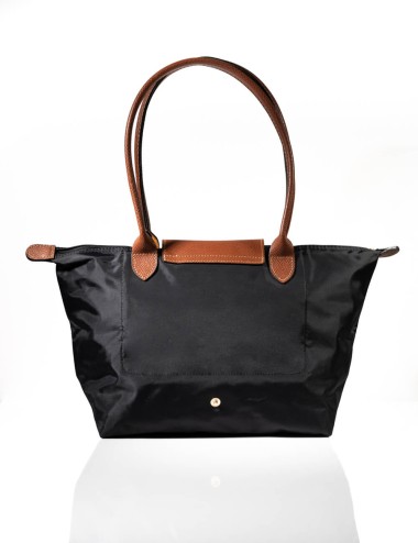 Cette image contient Sac à main Cabas Pratique chez Joliesse. à 69,99 TND en Tunisie. L'hexa de l'arrière plan est #E7E7E7