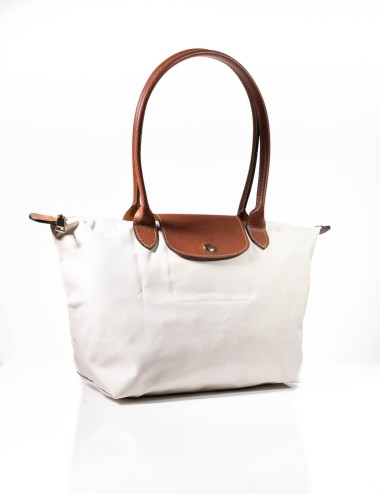 Cette image contient Sac à main Cabas Pratique chez Joliesse. à 69,99 TND en Tunisie. L'hexa de l'arrière plan est #E7E7E7