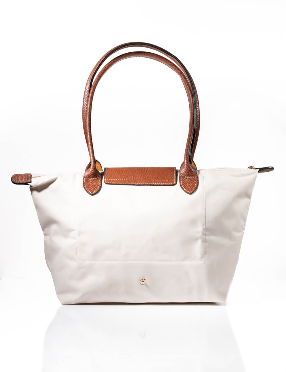 Cette image contient Sac à main Cabas Pratique chez Joliesse. à 69,99 TND en Tunisie. L'hexa de l'arrière plan est #E7E7E7