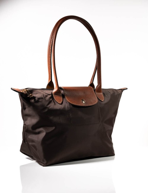 Cette image contient Sac à main Cabas Pratique chez Joliesse. à 69,99 TND en Tunisie. L'hexa de l'arrière plan est #E7E7E7