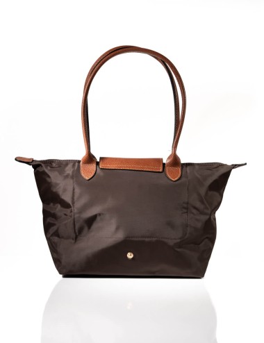 Cette image contient Sac à main Cabas Pratique chez Joliesse. à 69,99 TND en Tunisie. L'hexa de l'arrière plan est #E7E7E7