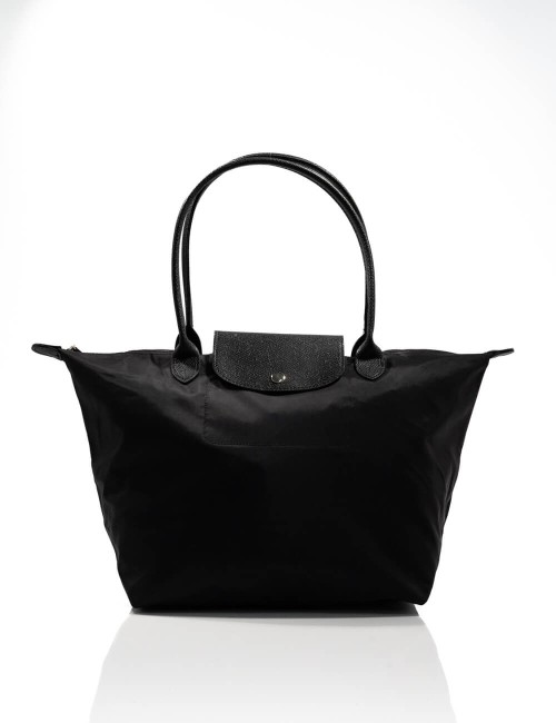 Cette image contient Grand Sac à Main pour Shopping chez Joliesse. à 79,99 TND en Tunisie. L'hexa de l'arrière plan est #E7E7E7