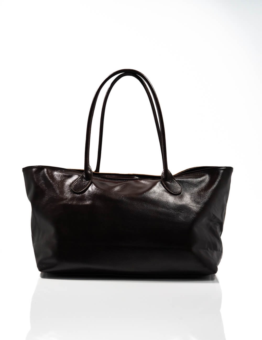 Cette image contient Sac Cabas Duo en cuir et daim chez Joliesse. à 169,99 TND en Tunisie. L'hexa de l'arrière plan est #E7E7E7